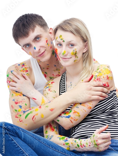 Portrait of woman and man covered with paints