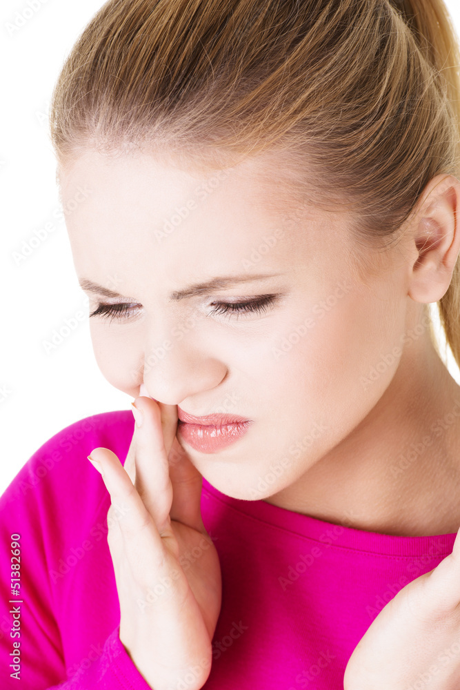 Teen woman having a terrible tooth ache. Teen woman having a terrible tooth ache.