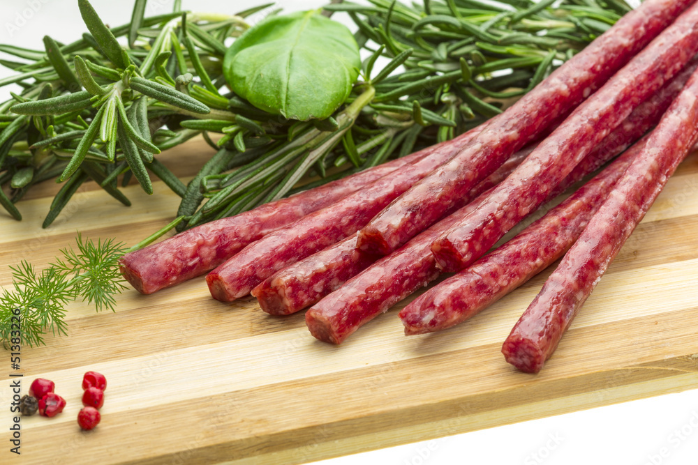 Salami with rosemary, basil and tomato Salami with rosemary, basil and tomato