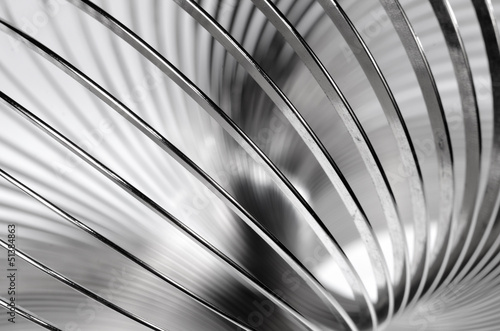 Canvas Print Metal slinky toy close-up