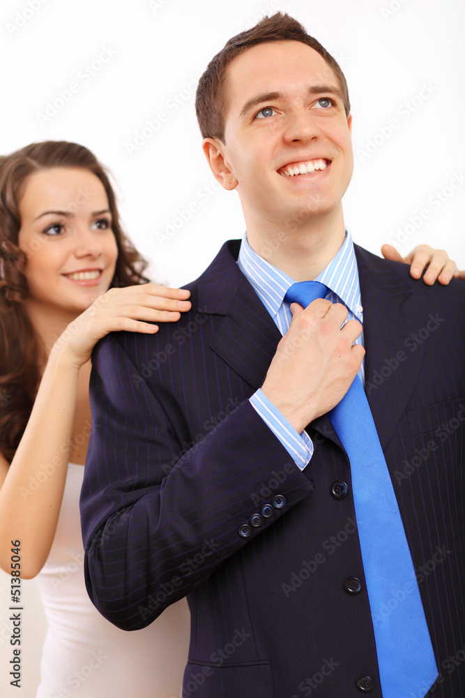 Businessman dressing at home in the morning Businessman dressing at home in the morning