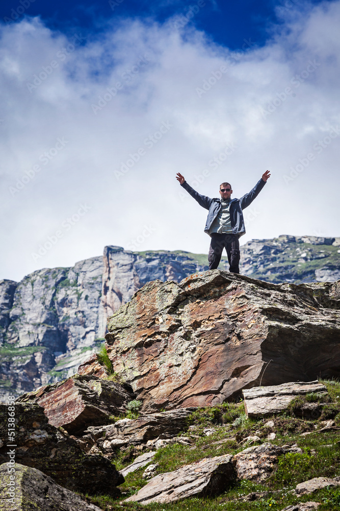 Fototapeta premium Happy tourist in mountains