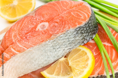 Salmon steak on a wooden board