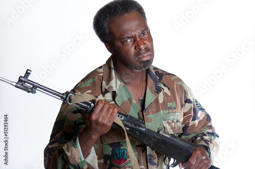 African American man with gun © Gunter_Nezhoda