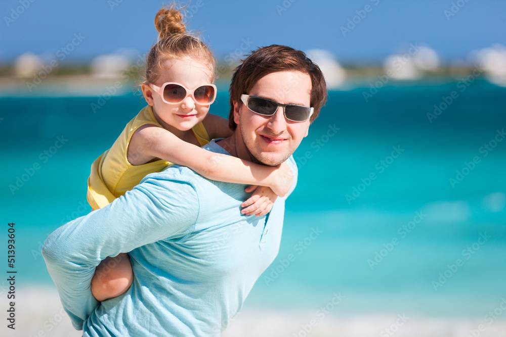Father and daughter at beach