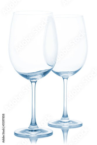 Empty wine glasses isolated on white