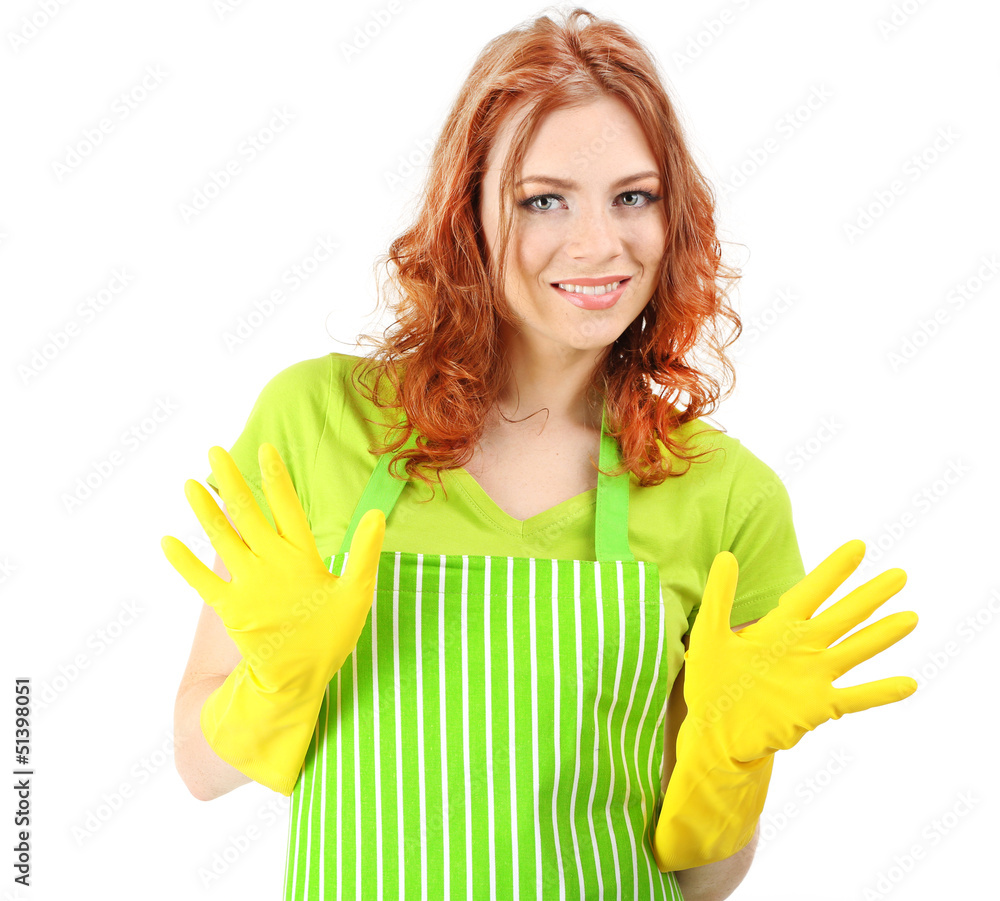 Young woman wearing green apron and rubber gloves, isolated Young woman wearing green apron and rubber gloves, isolated