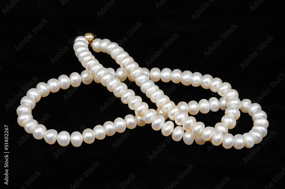 Pearl necklace © Arena Photo UK