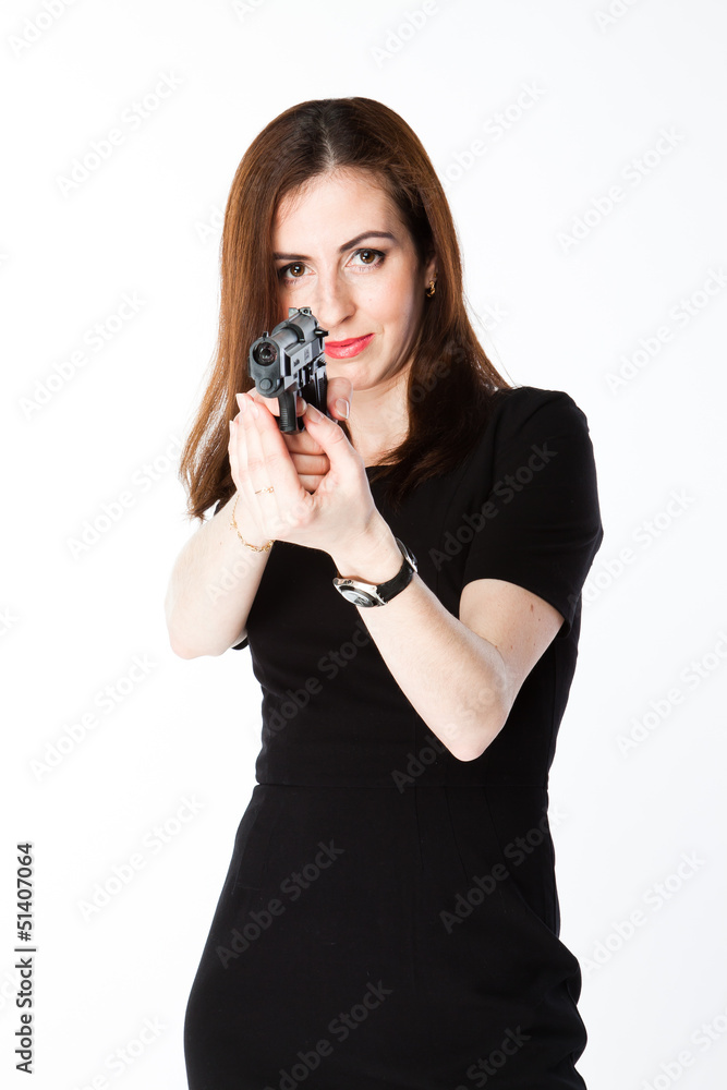 Young and beautiful woman with a gun Young and beautiful woman with a gun