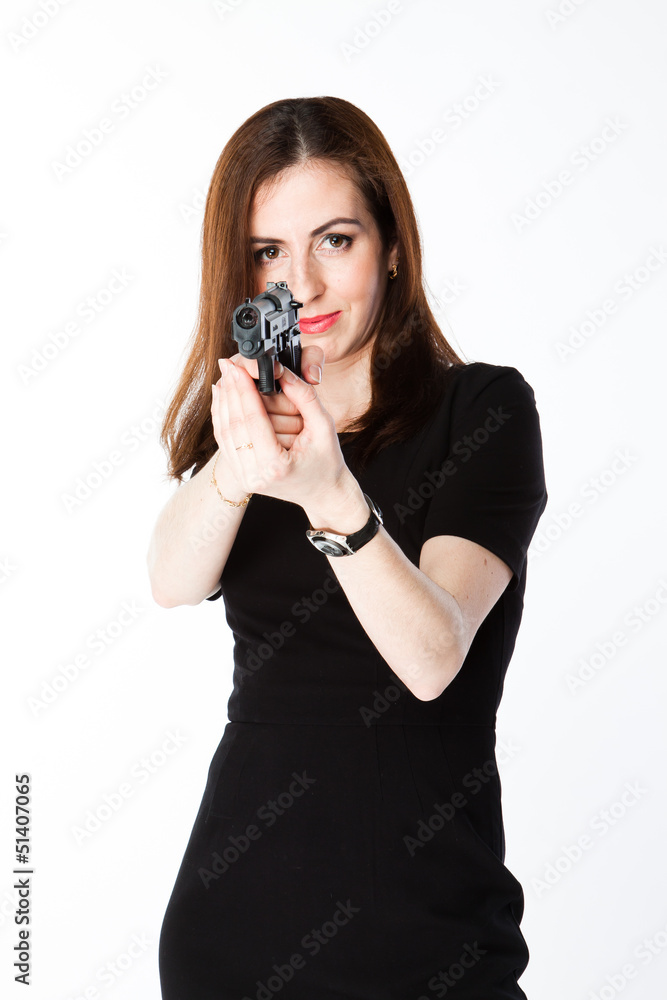 Young and beautiful woman with a gun Young and beautiful woman with a gun