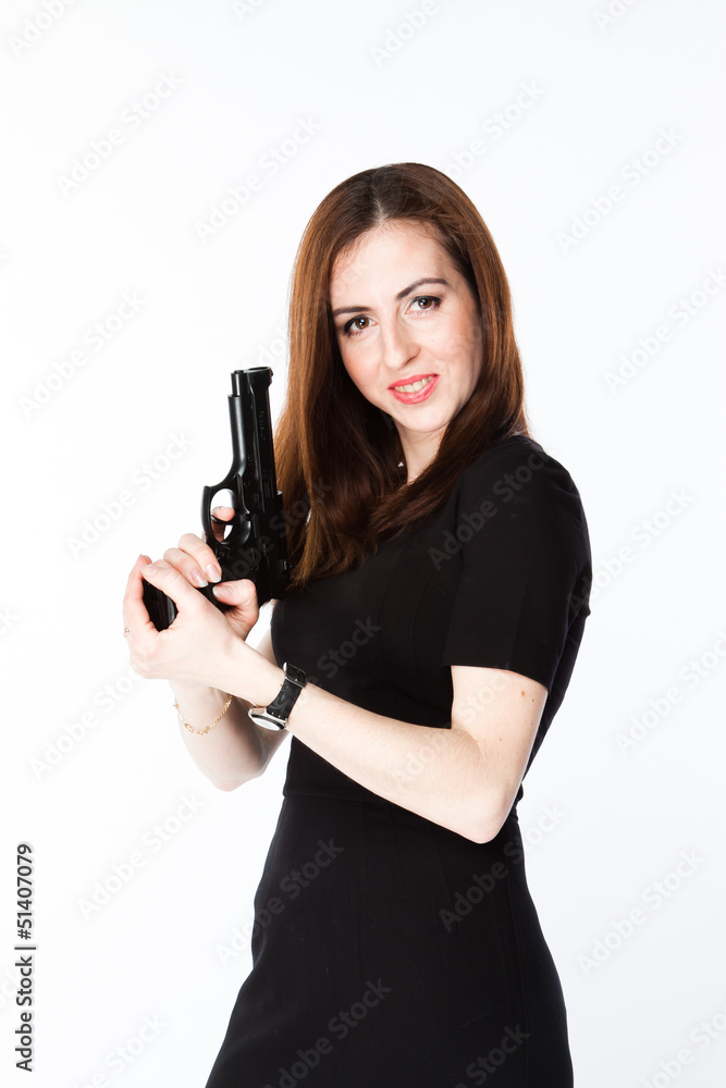 Young and beautiful woman with a gun Young and beautiful woman with a gun