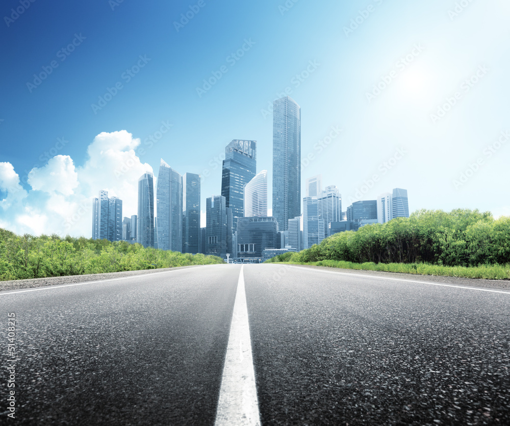 Asphalt road and modern city