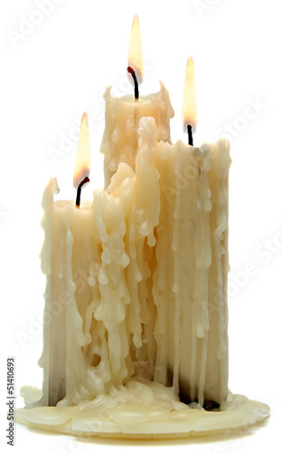 three beautiful old candle isolated on white background