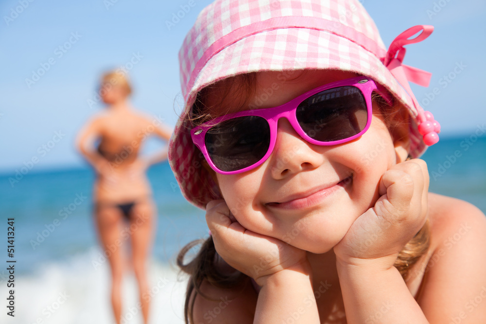 happy little girl on beach