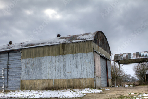 farm outbuilding on a  stormy day