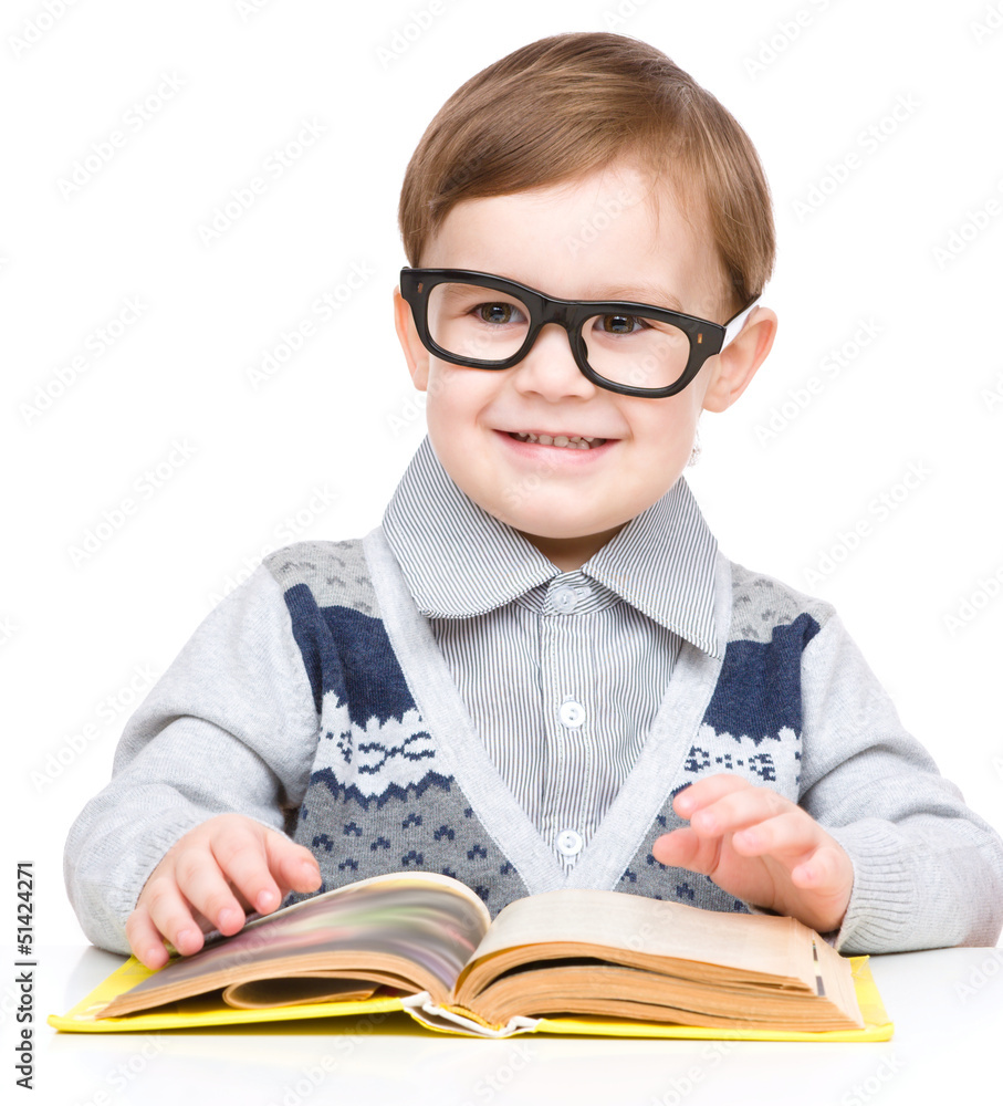 Little child play with book Little child play with book
