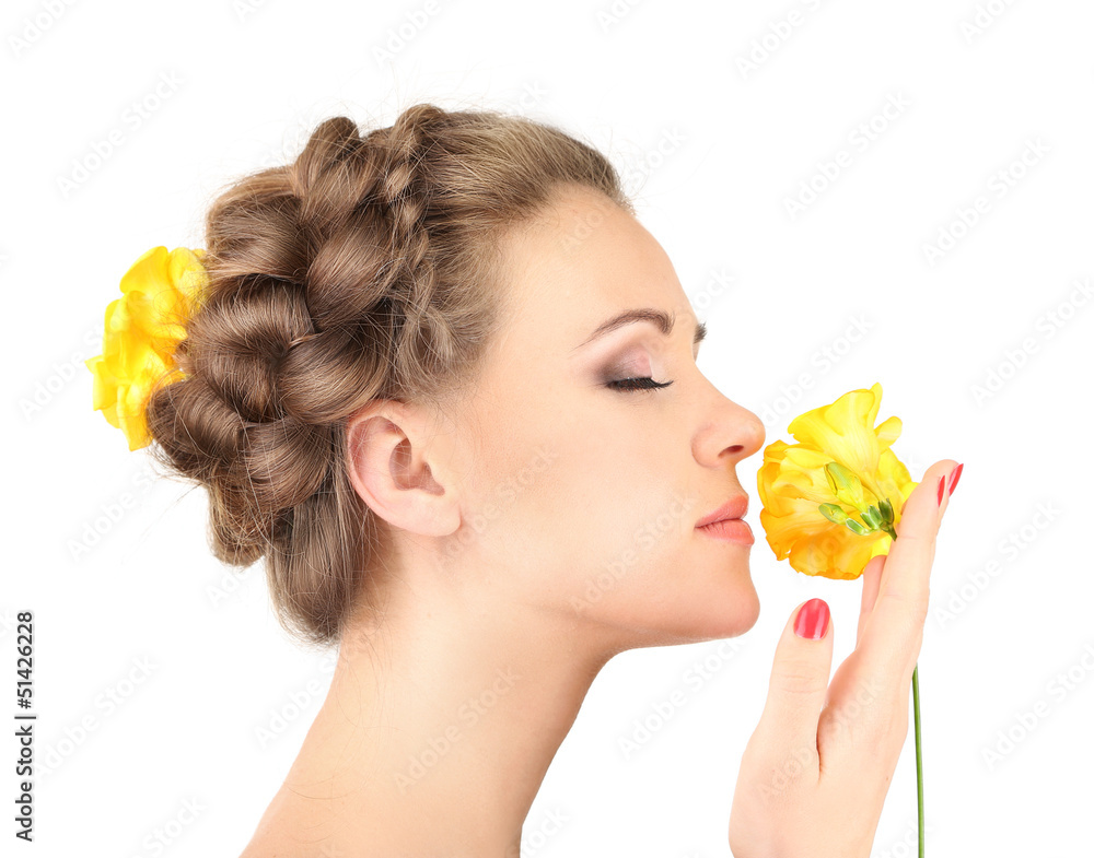 Young woman with beautiful hairstyle and flowers, isolated