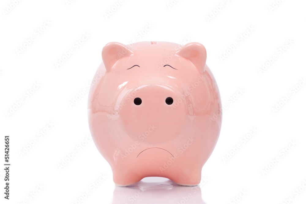Sad piggy bank isolated on white background