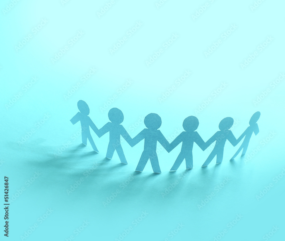 Team of paper doll people holding hands Team of paper doll people holding hands