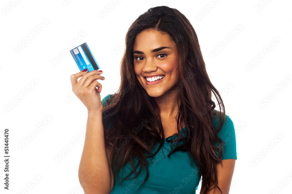 Attractive model displaying her credit card Attractive model displaying her credit card