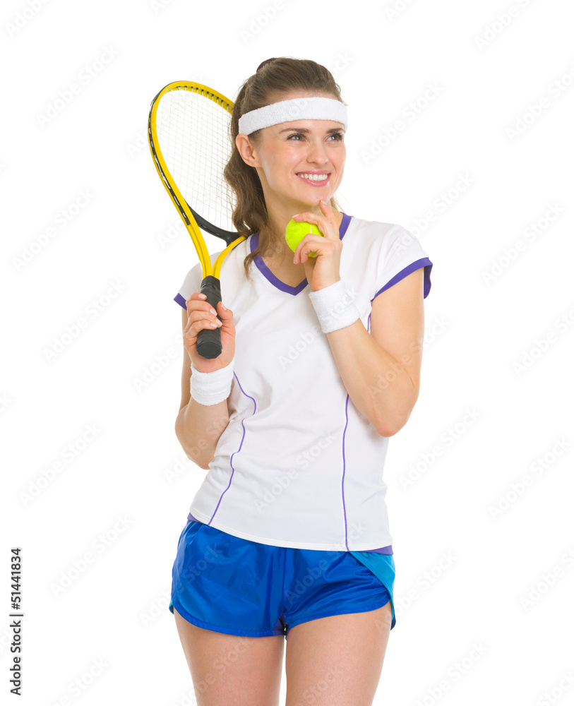 Smiling female tennis player looking on copy space Smiling female tennis player looking on copy space