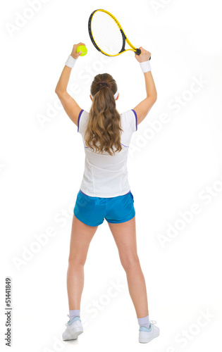 Full length portrait of female tennis player rejoicing success © Alliance