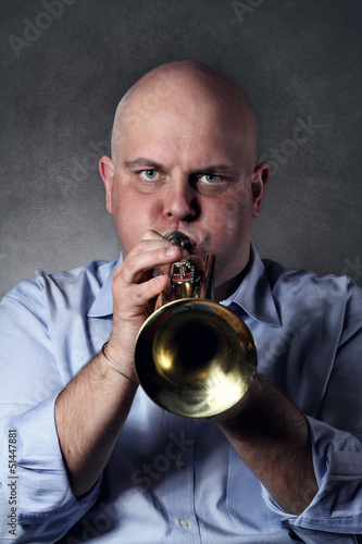 Man plays a trumpet