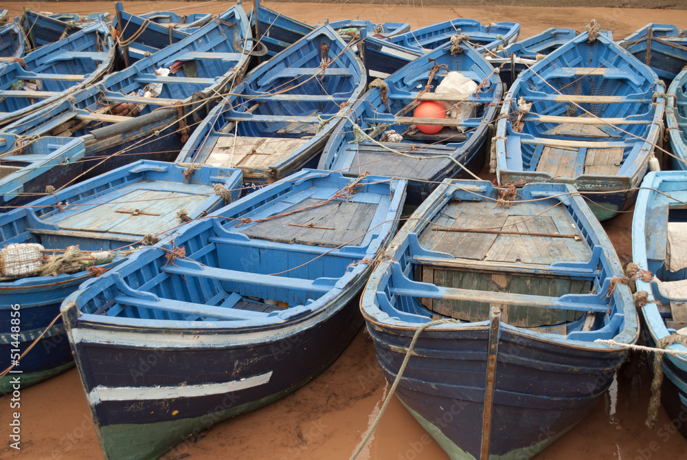 Blue fishing boats in harbor Essaouira Morocco