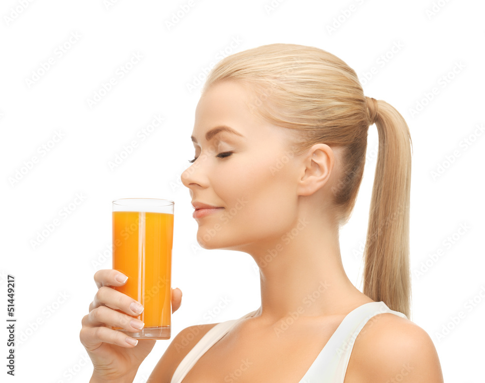 young woman drinking orange juice young woman drinking orange juice