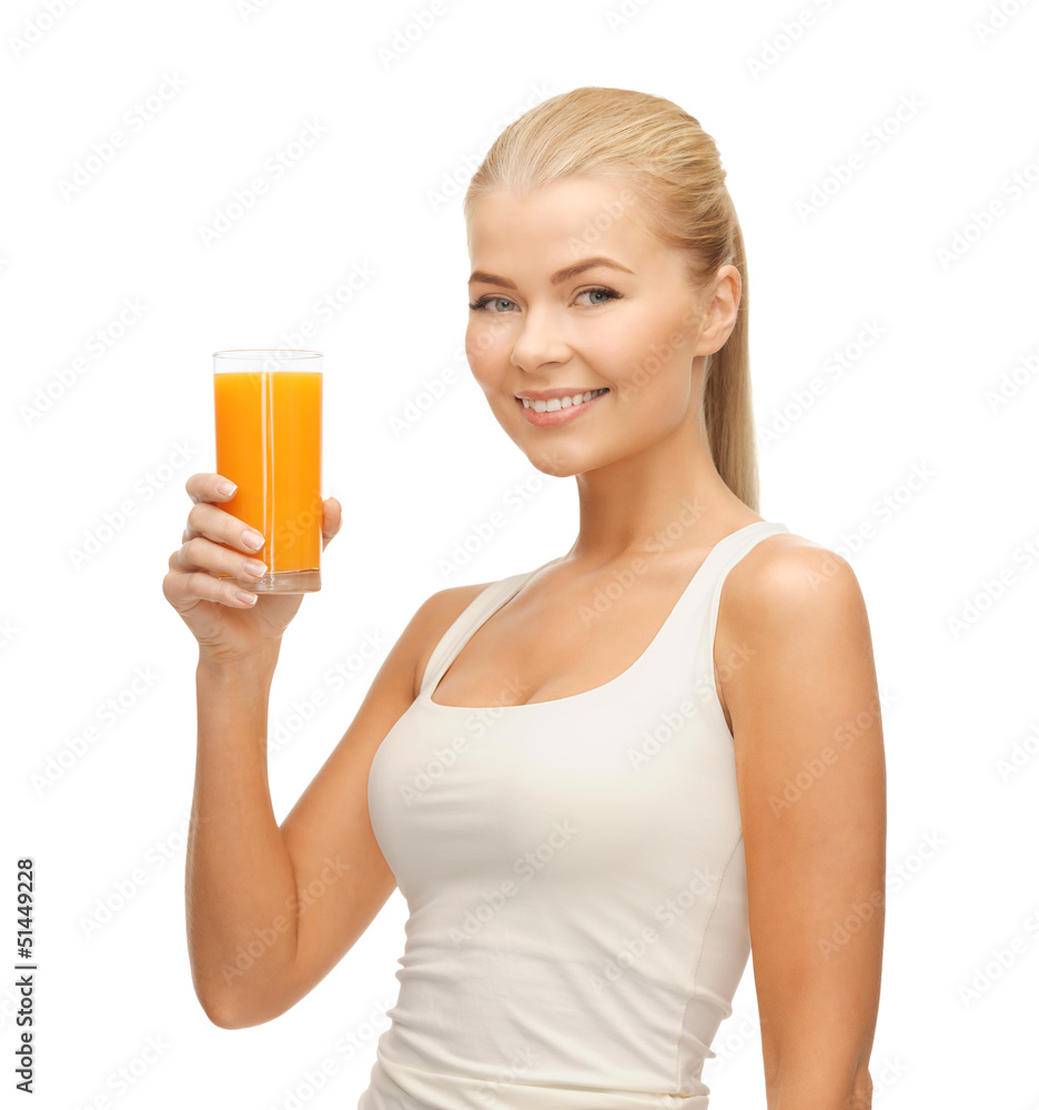 woman holding glass of orange juice woman holding glass of orange juice