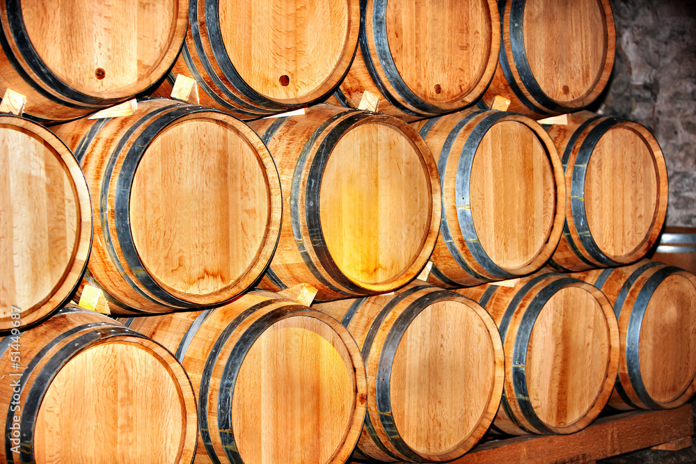 Barrel of wine in winery.