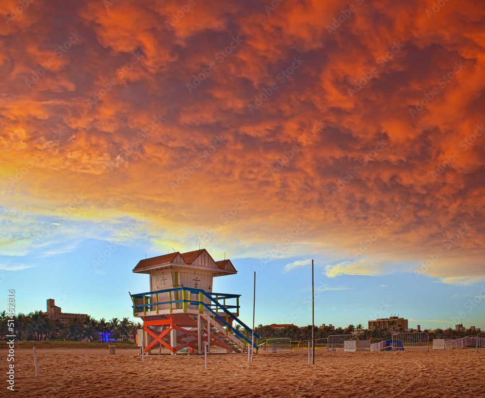 Fototapeta premium Miami Beach Florida, sunset with red storm clouds