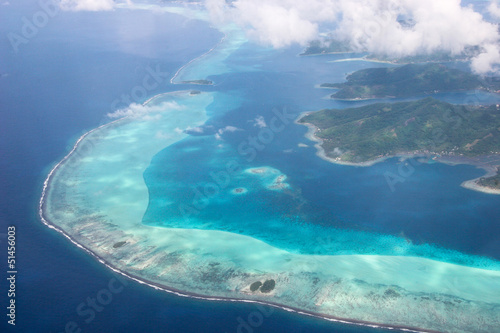Coastline of Taha’a, French Polynesia, surrounded by coral reefs