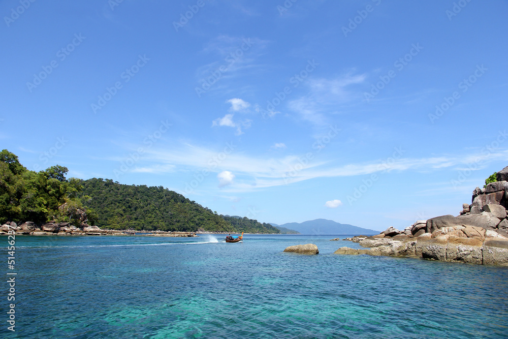 Rocky beach with blue sea from Thailand