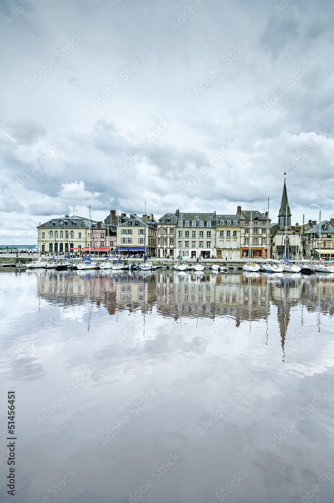 Honfleur skyline and harbor with reflection. Normandy, France