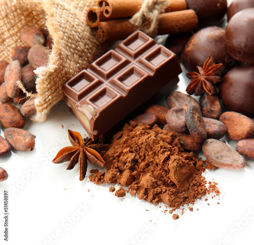 Composition of chocolate sweets, cocoa and spices, isolated