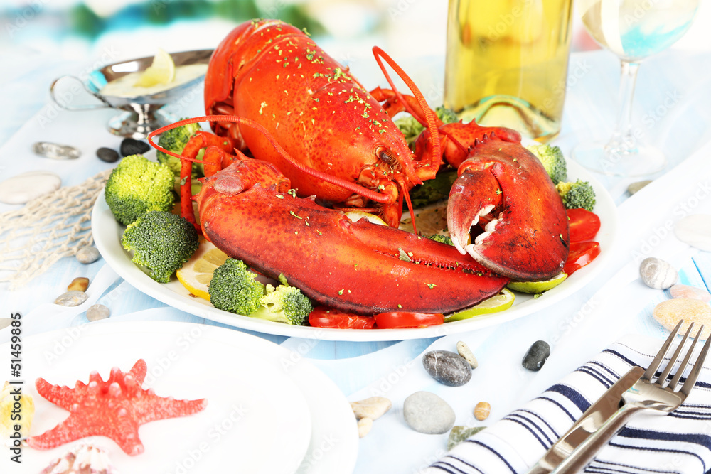 Red lobster on platter on serving table close-up