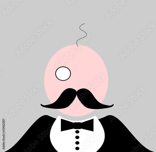bald man with monocle and tuxedo