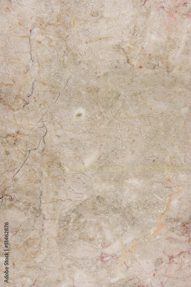 Fototapeta premium Natural pattern on a beige marble.