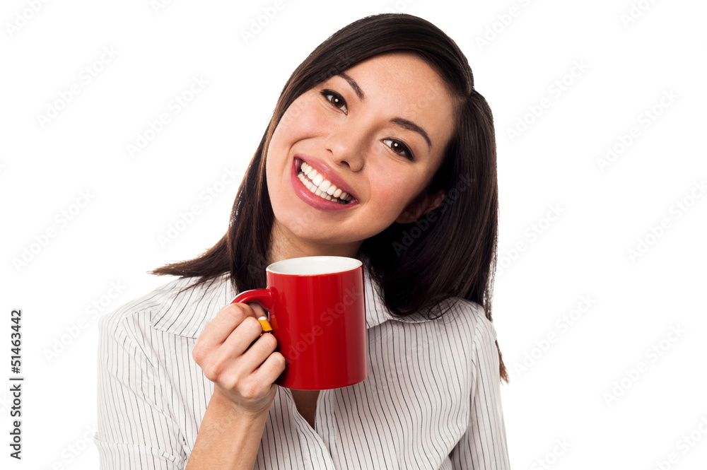 Woman enjoying coffee during work break Woman enjoying coffee during work break