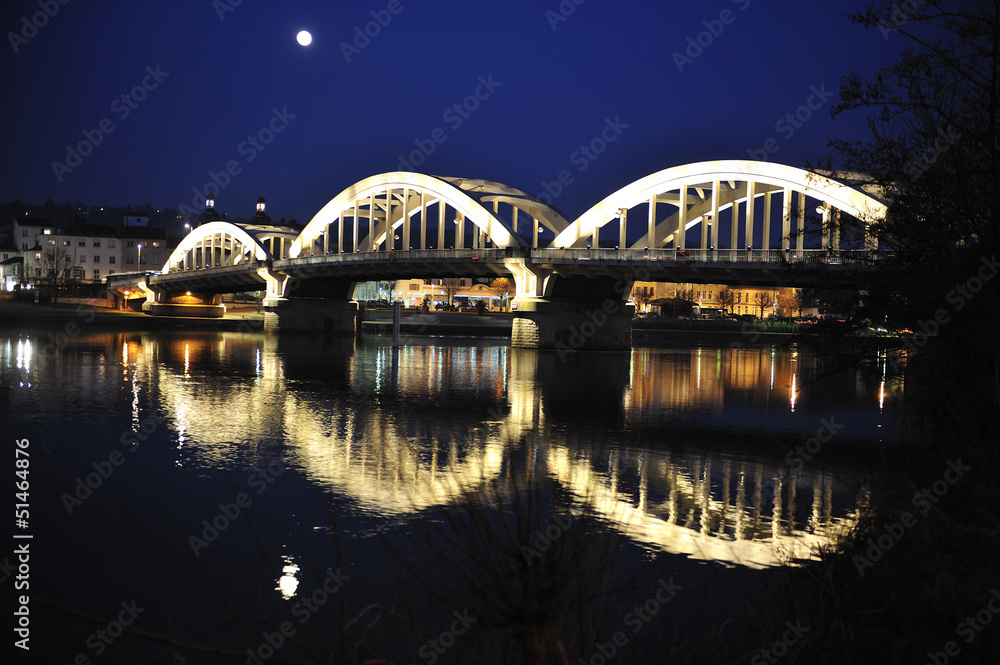Night view of the iron bridge over the river Saone Albigny commu