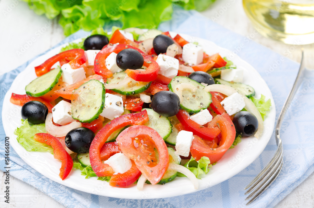 Greek salad with feta cheese, olives and vegetables, horizontal