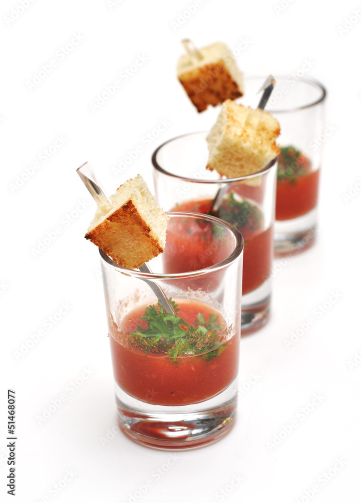 ketchup in ramekin on white background ketchup in ramekin on white background