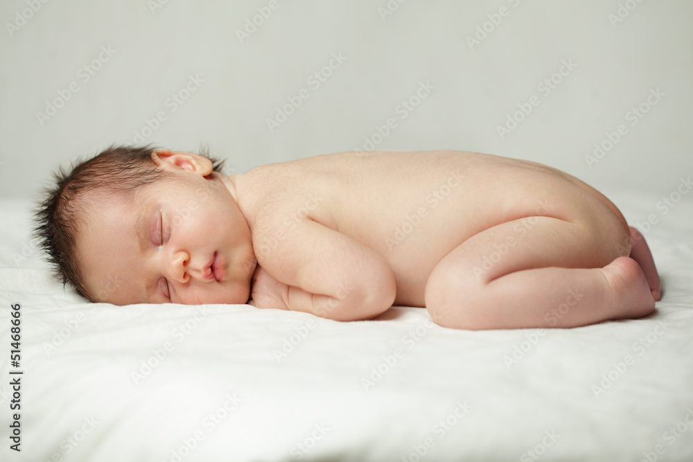 Sleeping baby, up to one month, newborn on background Sleeping baby, up to one month, newborn on background