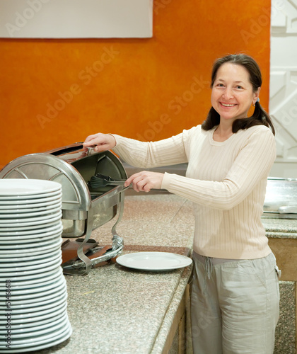 Woman at buffet photo