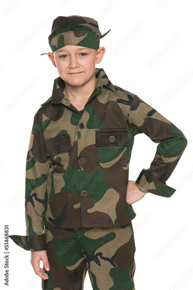 Young boy dressed in camouflage Young boy dressed in camouflage