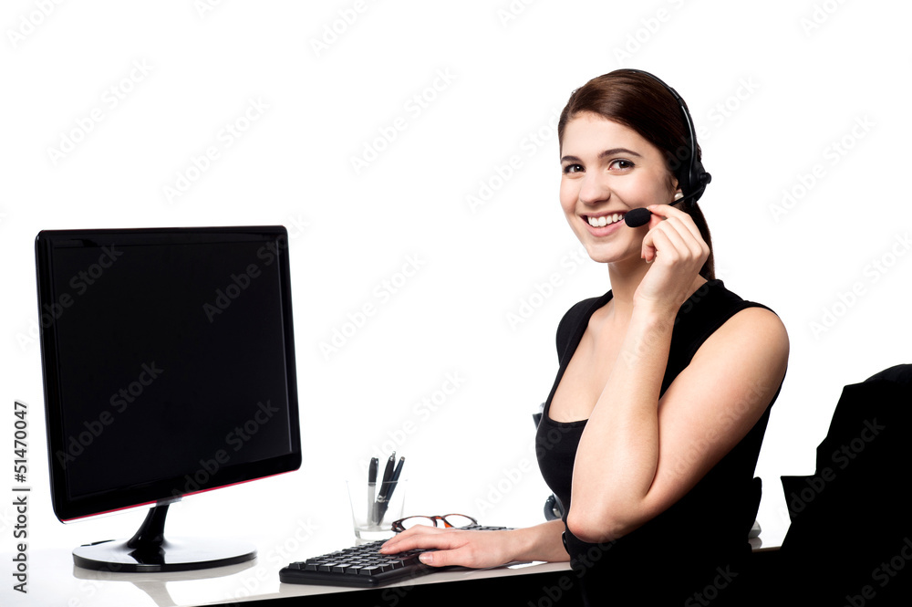 Female executive assisting client over a call Female executive assisting client over a call