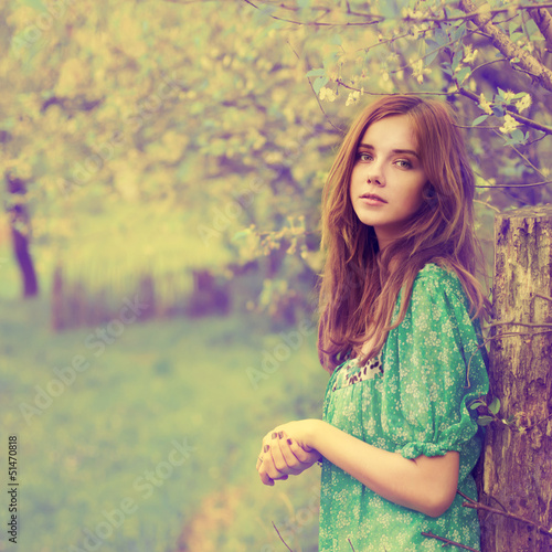 Vintage photo of beautiful girl in spring photo