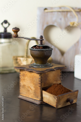 Coffee mill with freshly ground coffee