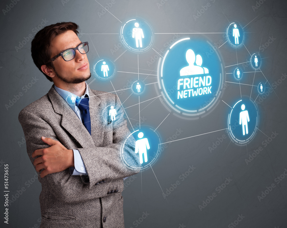 Handsome man looking at modern social network Handsome man looking at modern social network